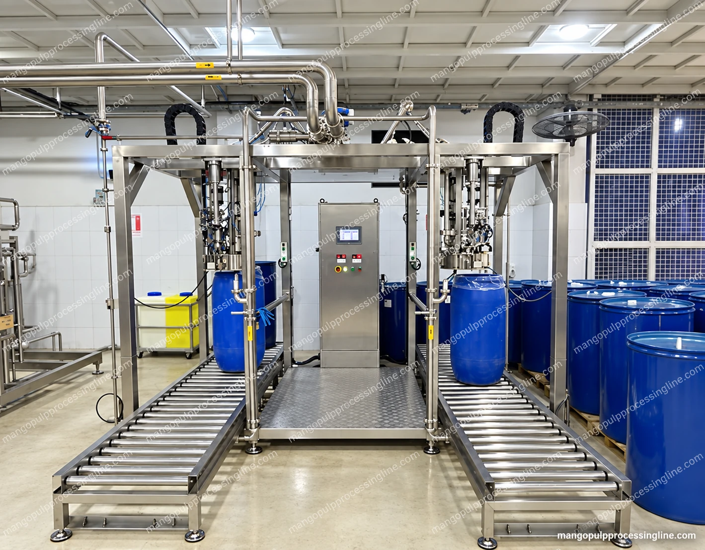 Twin-position aseptic bag filler above two drum roller conveyor lanes